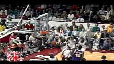 Michael Jordan changes to a layup realizing he can't make the dunk