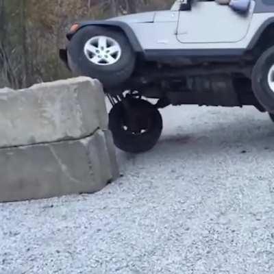 What did he think was going happen while driving over a concrete block.