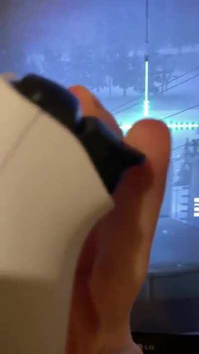 The PS5’s adaptive trigger on the sniper mission