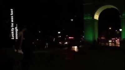 NYPD police car attempts to run over bicyclist in park