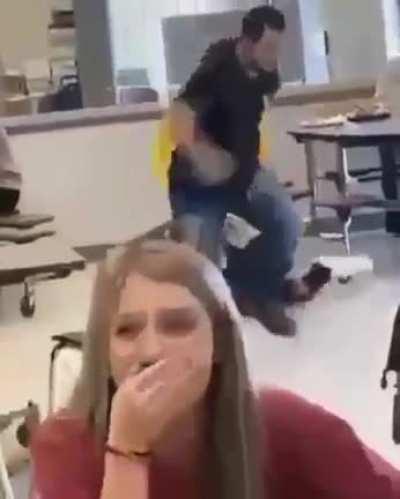 A Georgia student grabs and drags student on the floor by their Pride Flag and trashes it.