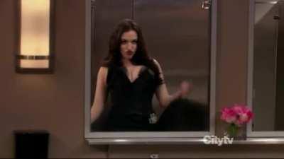 Kat Dennings doing what she does best