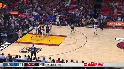 [Highlight] Jimmy hits the tough middy over the Mavs big 2 deep in the 4th