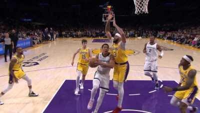 [Highlight] AD takes an elbow to the private area from Bane