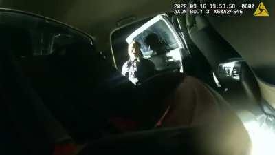 Cops handcuff and detain suspect in squad car parked on railroad crossing, which is then hit by a speeding train