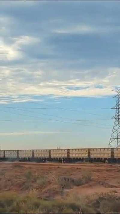 Irish lad waiting for Aussie Road Train to pass