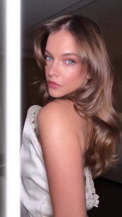 Barbara in white dress in NYC - IG December 2025