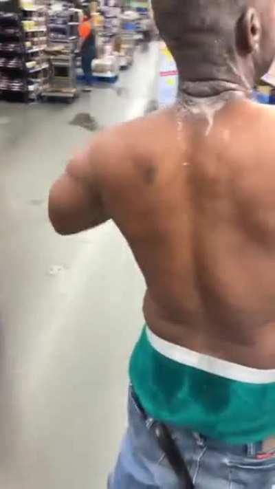 Man on drugs destroys & eats everything at Walmart