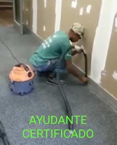 This man vacuuming...