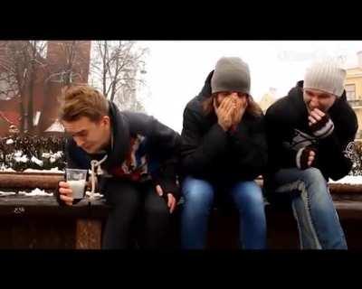 The guy is drinking other people's spit