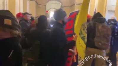 Trump supporters in hundreds keep pouring into the Capitol Building, storming around the to find a way inside the chamber. Secret Service is currently guns drawn on several protestors.