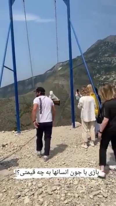 two women fall of a swing on the edge of a 6300ft precipice in Dagestan, Russia
