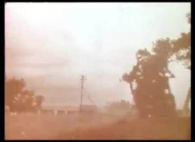 Original Jawa Advertisement at foothills of Chamundi hill, Mysore, India. Filmed between 1961/1962