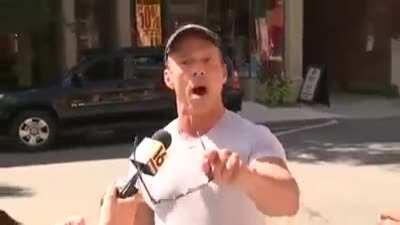 Guy is confused by parking meter