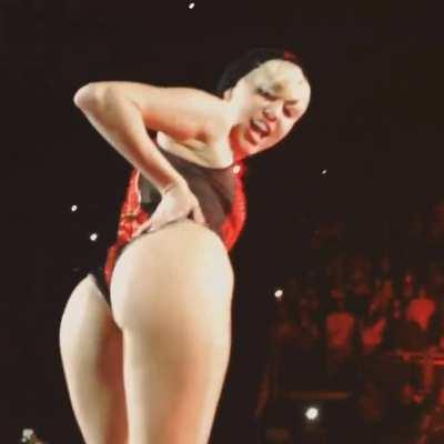 Would you rather bust on Miley Cyrus' ass or her tongue?