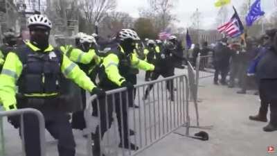 MAGA protesters are spraying pepper spray back at police on Capitol Hill.