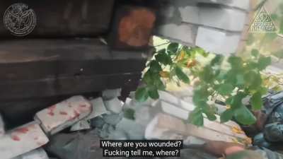 Russian MT-LB was ambushed by Kraken Regiment soldiers and crashed into a house. The leg of a Russian soldier is squeezed by a collapsed wall. Another is found hiding in the outhouse and killed at close range. Sept 2022 | enemy visible