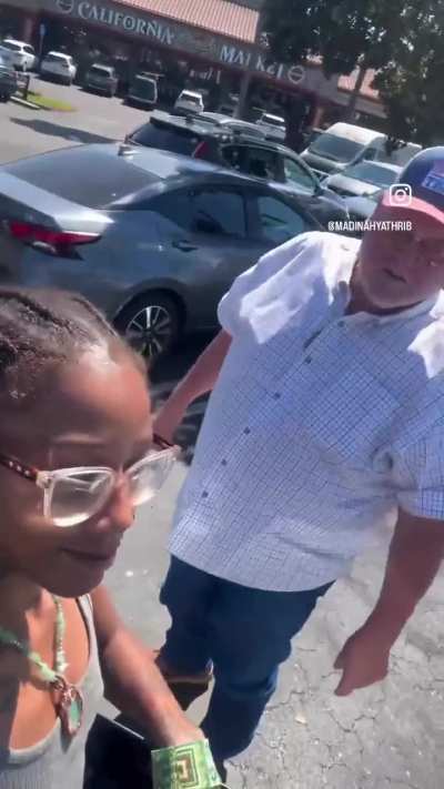 Maga man calls woman the N word Slur over a parking space
