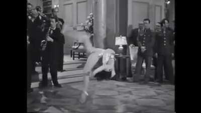 Miriam LaVelle flipping in heels, 1944.