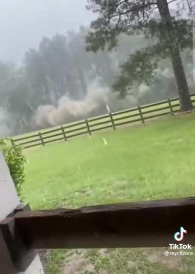 This woman was able to film lightning and keep recording.