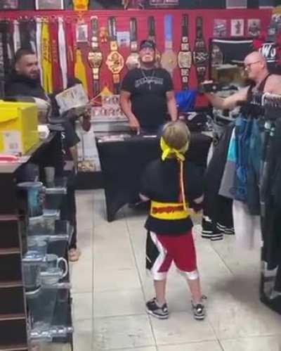 kid walks into Hulk Hogan’s store