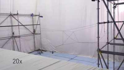 Quadrocopters autonomously assembling a bridge