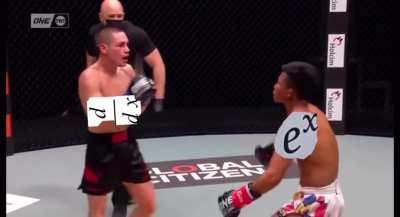 AND HE STANDS THERE, UNFAZED