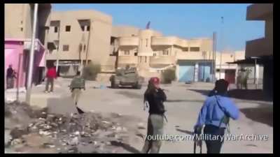 An IS tank pulls into an intersection to take a couple of shots, only to be hit by an ATGM. (The Date/location is Unknown)
