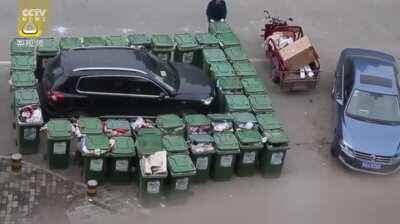 Road sweeper dealt out his own version of street justice to punish an illegally parked car.