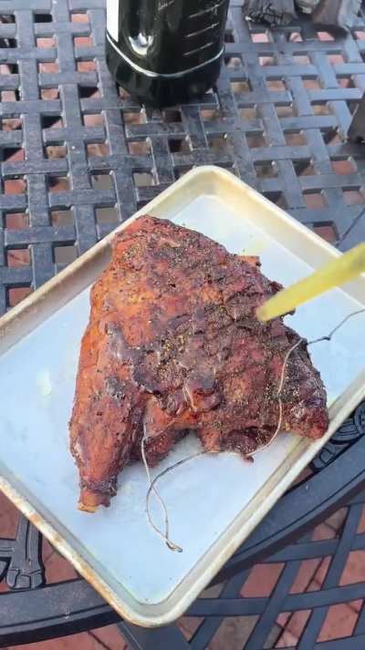 Cured leg of lamb stuffed with mint & garlic, smoked on cherry, seared on open wood flame