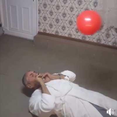 Stabbing a balloon...
