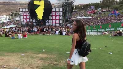 Naughty Kim flashing her tits at a crowded concert