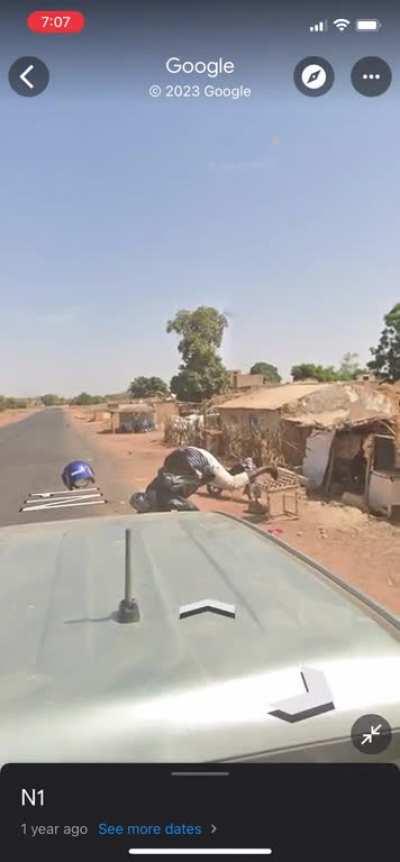 Motorcyclist makes a uturn in front of the Google Streetview car and causes a crash.