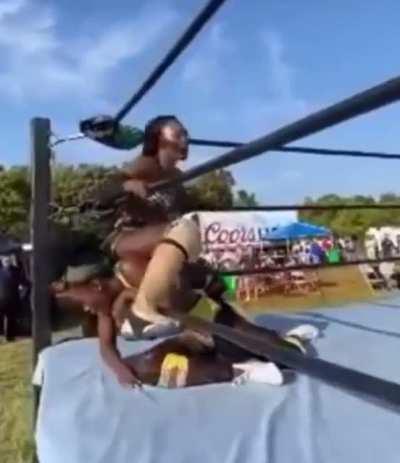 Queen Aminata uses her opponent’s face as a towel on a hot summer day.