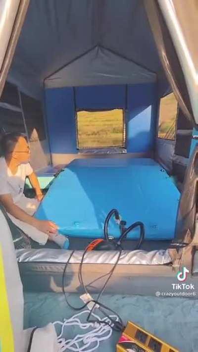 An inflatable houseboat you can transport in your vehicle or some other big items