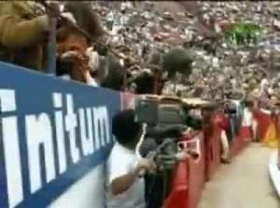 Bull jumps into spectators