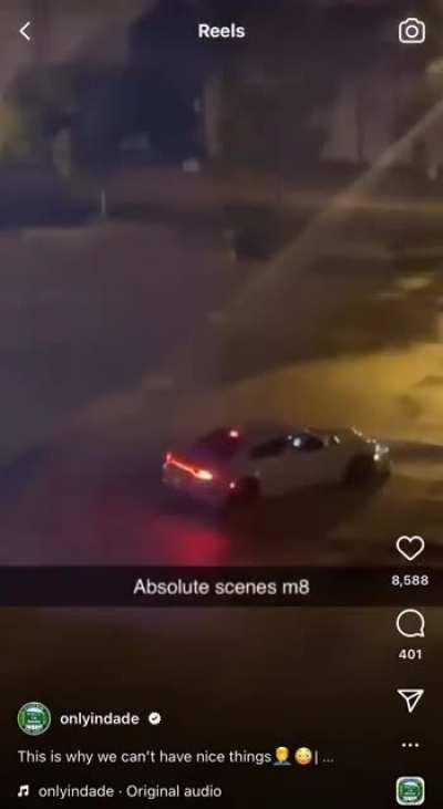 Drifting Dodge Charger rams light pole (FL)