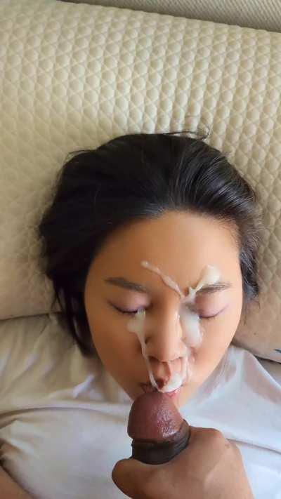 Thick cumshot to the eyes for a nice facial