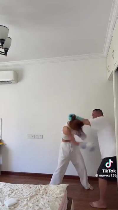 Asian couple going hard at each other.