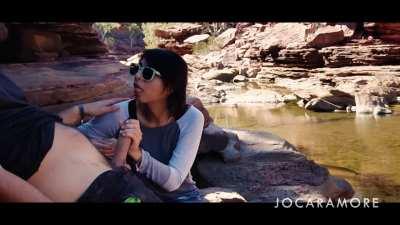 Barely fitting inside her mouth.