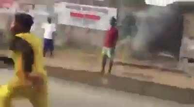 Guy tried to jump above a moving car