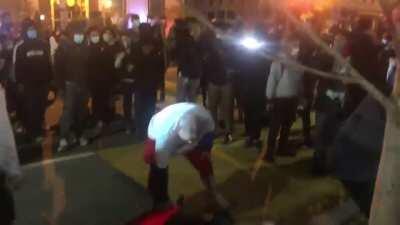 Black Lives Matter and Antifa militants shove an elderly Trump supporter to the ground, spit on him, and steal his belongings while laughing at him. [11/14/20]