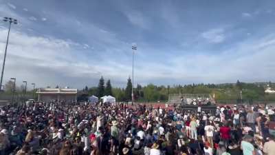 Thousands of people fighting against oligarchy at a rally at Folsom Lake College in California.