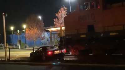 Cool-looking Mazda getting slammed by a freight train in Washington state