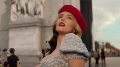 Zoey Deutsch wearing red lipstick in Not Okay (2022)