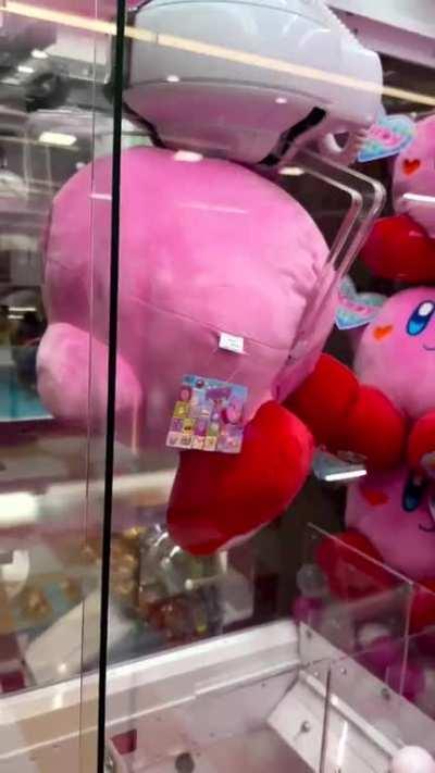 Winning a giant Kirby plushie from an arcade in Tokyo (May 20230)