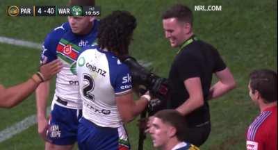 Cameraman gets taken out by NRL player, but still manages to get the perfect shot at the end