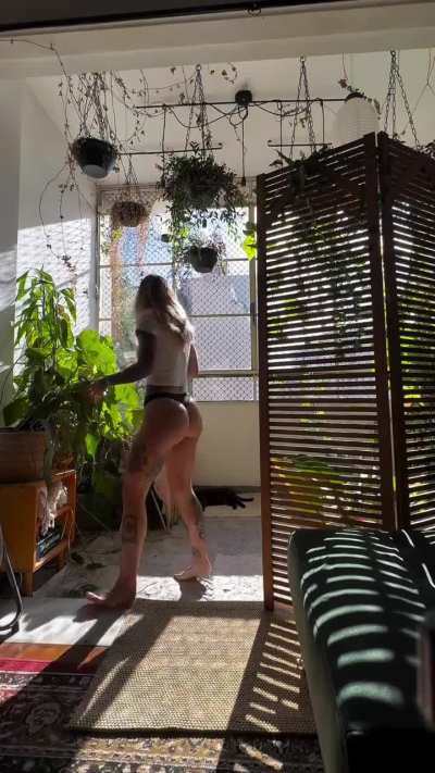 I like how attentive she is to her plants.