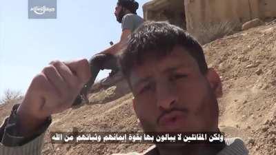 A rebel from Jaysh al-Islam gives a sign-language report from the frontlines in Eastern Ghouta [Syria] (March 2016)