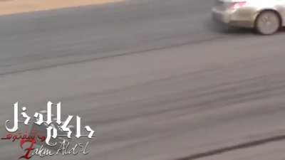 Saudi police shut down illegal drifting event, spectators flee.
